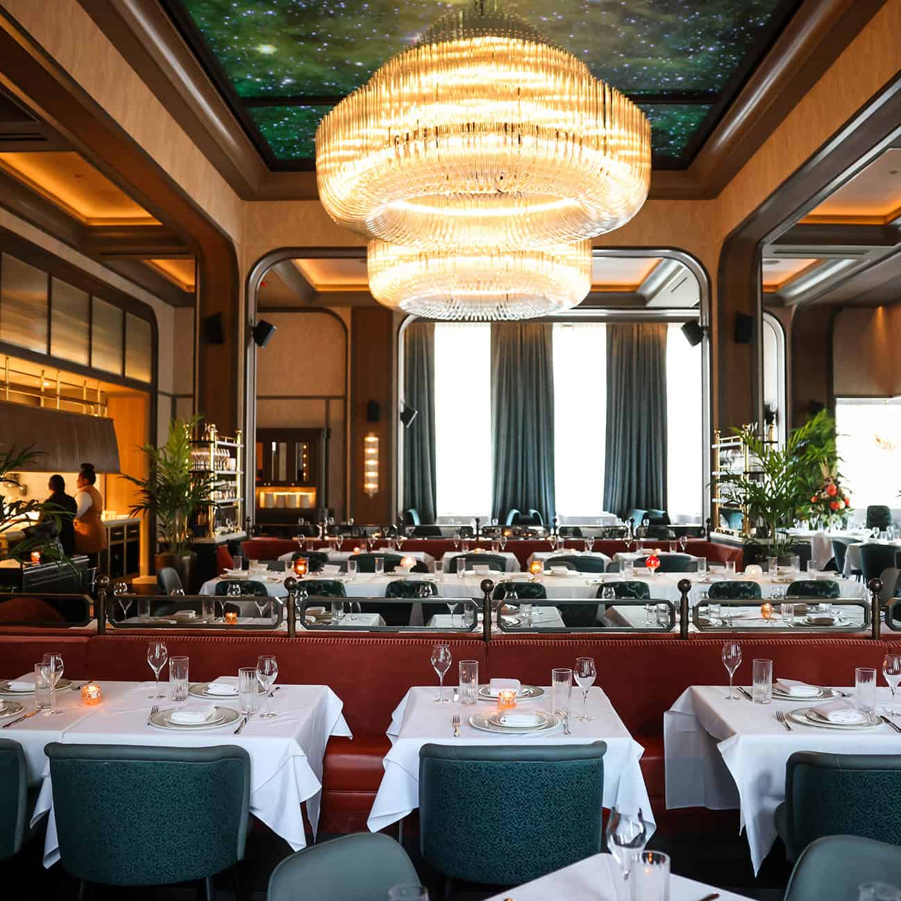 Upscale restaurant dining area with modern decor and ambient lighting at The Alston.