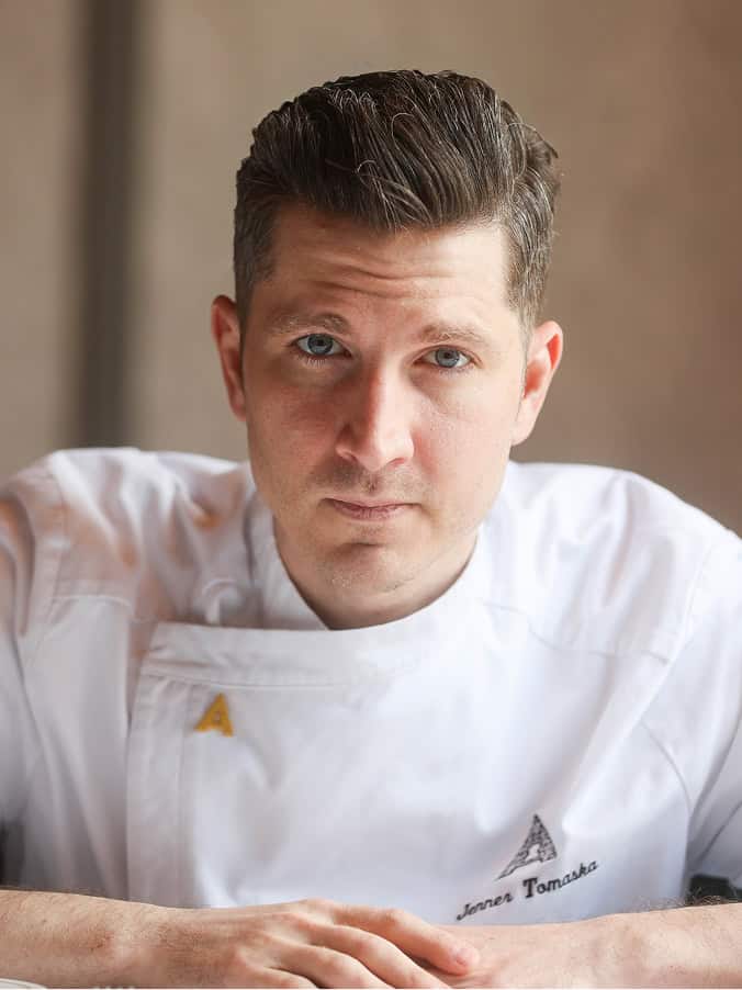 Portrait of a professional chef in white uniform at The Alston.