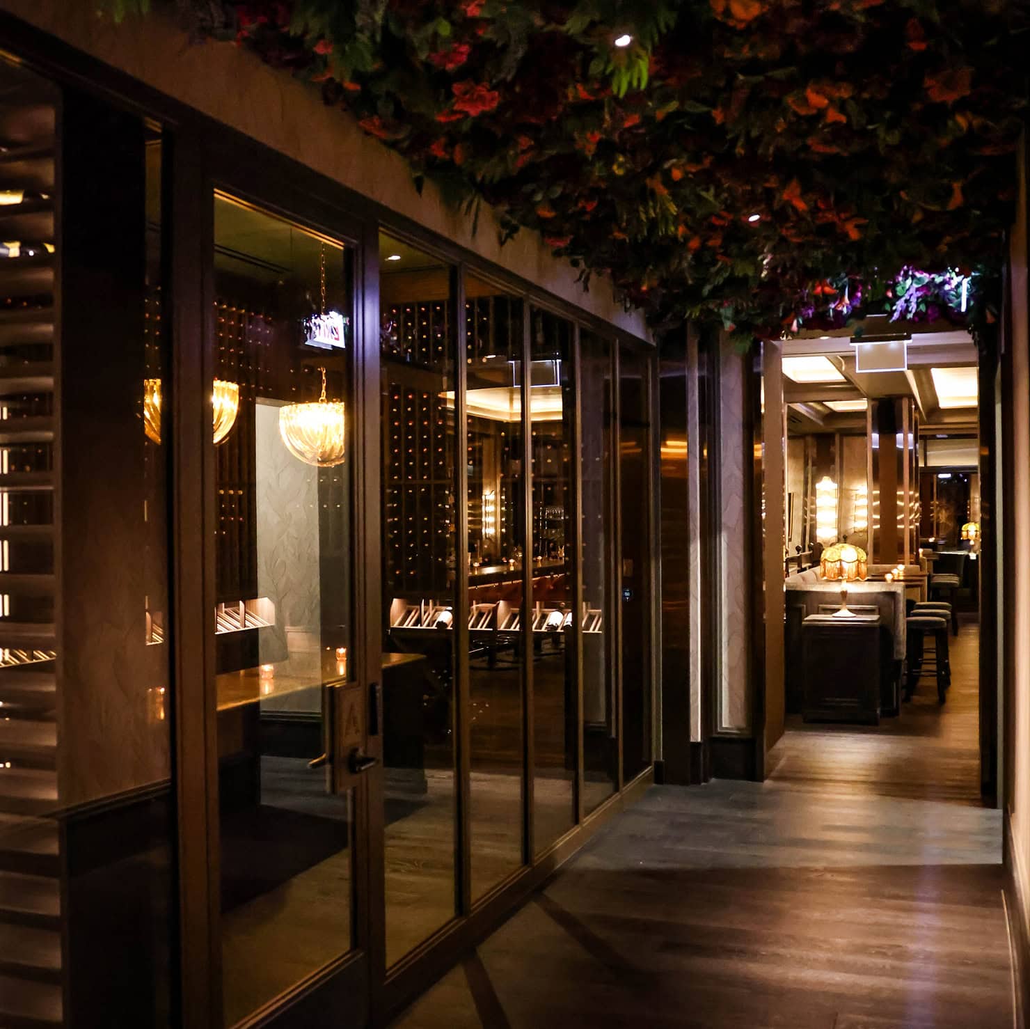 Luxurious members club interior with elegant decor and ambient lighting.